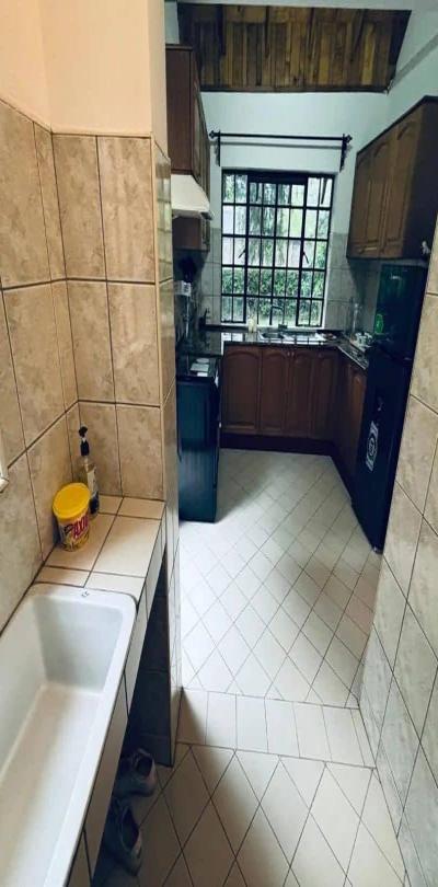 IPH: A Fully- Furnished Three-Bedroom Apartment for Rent - Njiro.